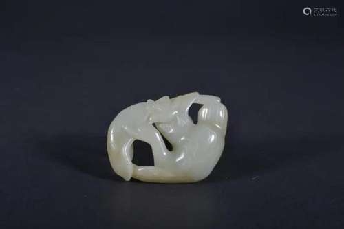 A CARVED JADE 'DUCK' PENDANT.QING PERIOD
