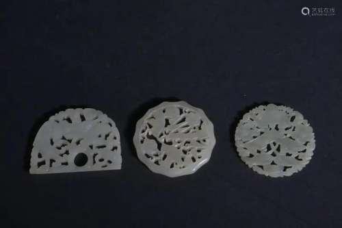 THREE CARVED JADE PLAQUES.QING PERIOD