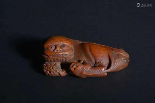 A CARVED BAMBOO LION.QING PERIOD