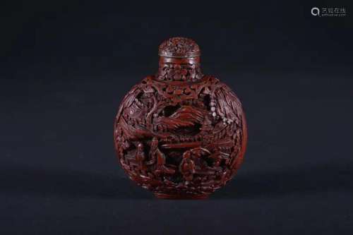 A CARVED CINNABAR LACQUER SNUFF BOTTLE.QING PERIOD