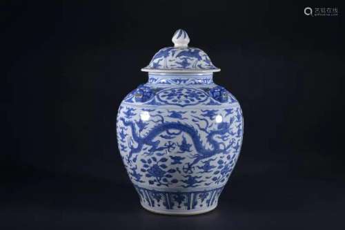 A BLUE AND WHITE 'DRAGON' JAR AND COVER.MARK OF JIAJ...