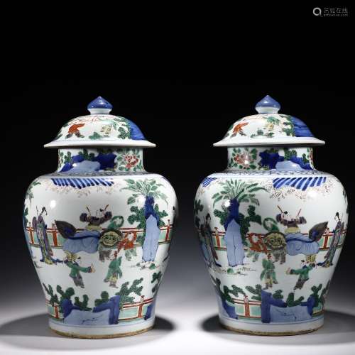 Pair of Underglaze Blue and Wucai Figure Jars and Covers
