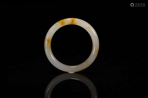 Carved White and Russet Jade Bangle