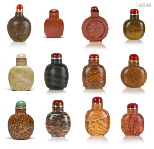 GROUP OF TWELVE  STONE CARVED SNUFF BOTTLES
