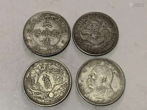 Four Chinese Coins