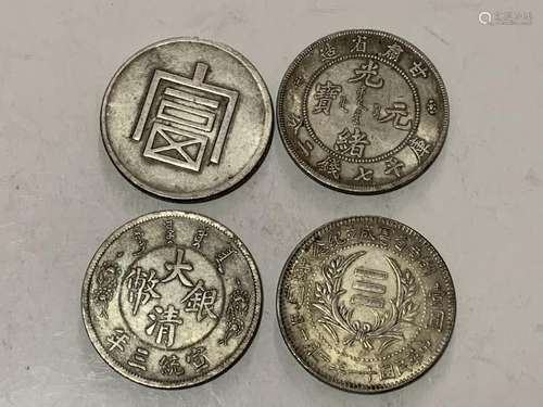 Four Chinese Coins