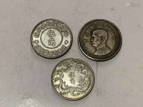 Three Chinese Coins