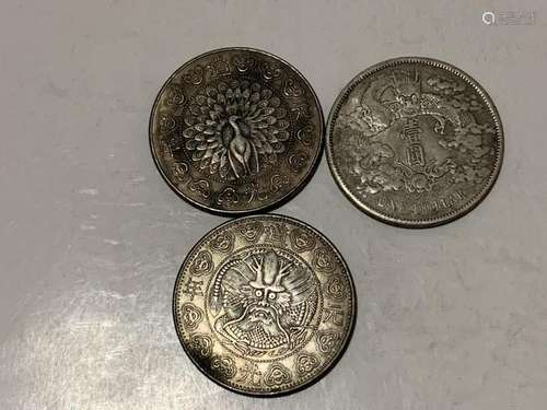 Three Chinese Coins