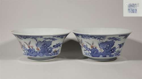 A pair of blue and white underglaze red bowls in Qianlong of...