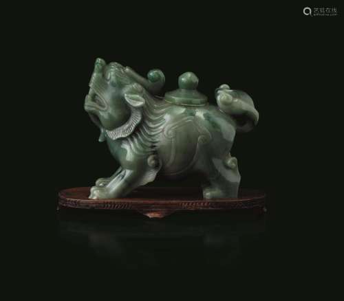 Apple green jade in the shape of a lion A jade vase, China, ...