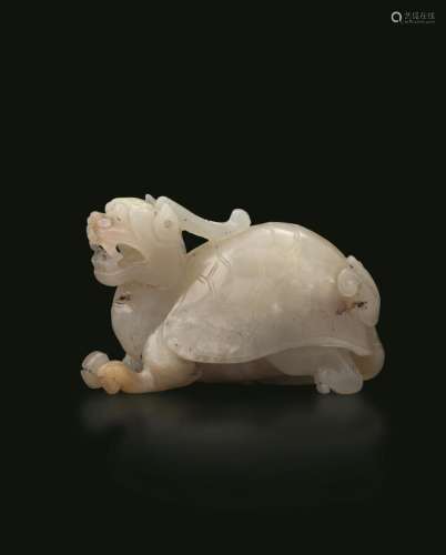 Qing Dynasty, Qianlong period (1736-1796) A white jade and r...