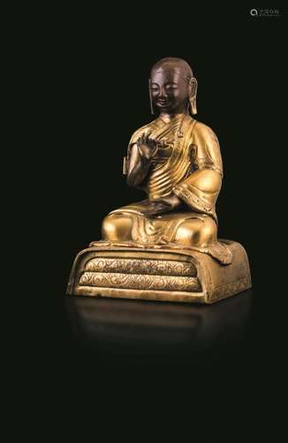 A gilt bronze figure, Tibet, 1800s