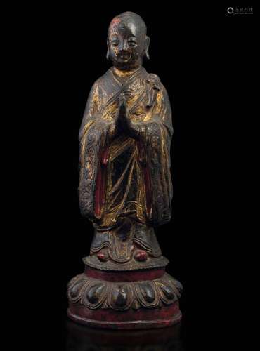 Traces of gilding and polychromy A bronze figure, China, Min...