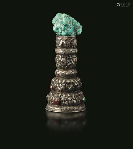 Turquoise and semiprecious stone inlays. A silver stupa, Tib...