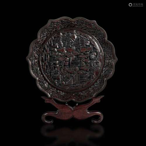 Apocryphal Qianlong mark A lacquer plate, China, Qing Dynast...