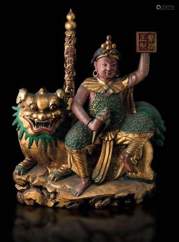 Early 1800s. A lacquered and gilt wood group, China, Qing Dy...