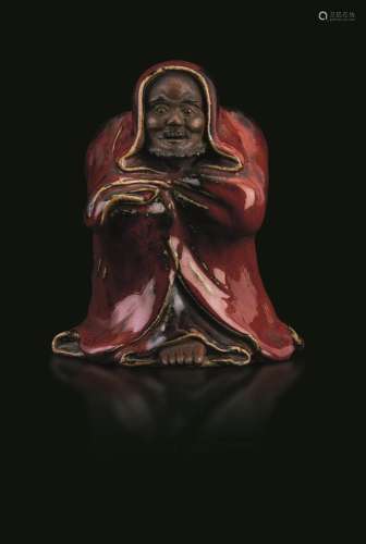 An Yixing porcelain figure, China, Qing Dynasty