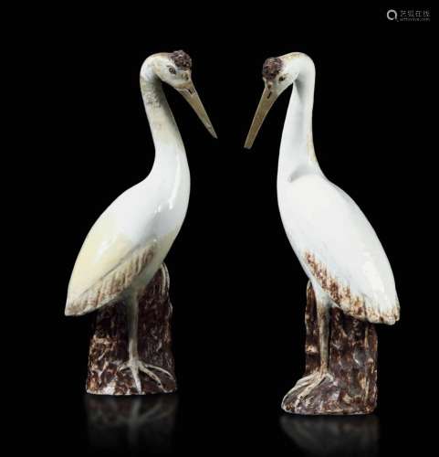 Two enamelled porcelain herons, China, 1800s
