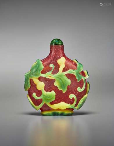 A GREEN AND YELLOW-OVERLAY TRANSPARENT MULBERRY-RED GLASS SN...