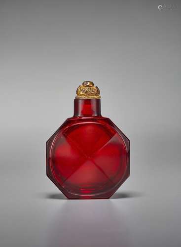 A TRANSPARENT RED GLASS FACETED SNUFF BOTTLE