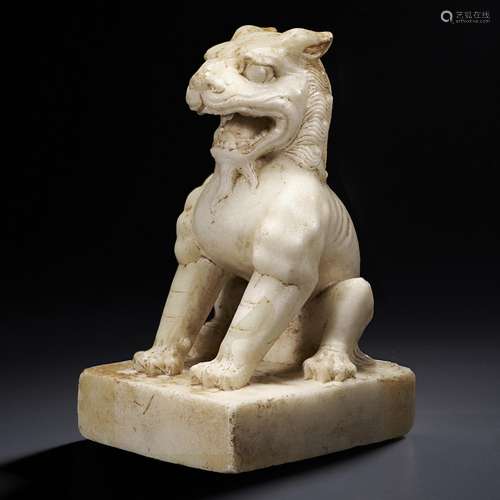 A SUPERB CARVED WHITE MARBLE FIGURE OF A LION