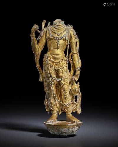 A RARE LARGE GILT-BRONZE FIGURE OF A BODHISATTVA