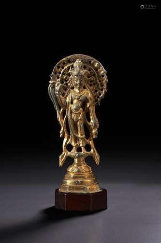 A SMALL GILT-BRONZE FIGURE OF GUANYIN