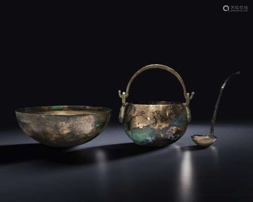 TWO BRONZE BOWLS AND A LADLE