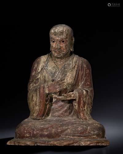 A POLYCHROME LACQUERED WOOD FIGURE OF A LUOHAN