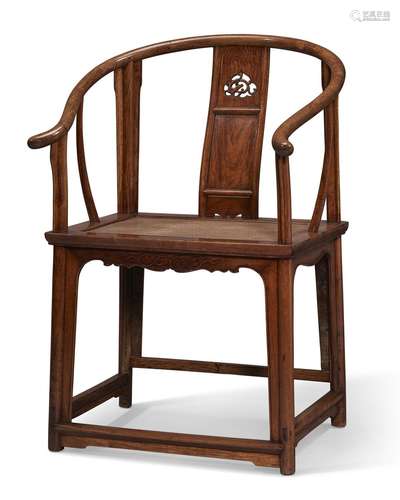 A RARE HUANGHUALI HORSESHOE-BACK ARMCHAIR