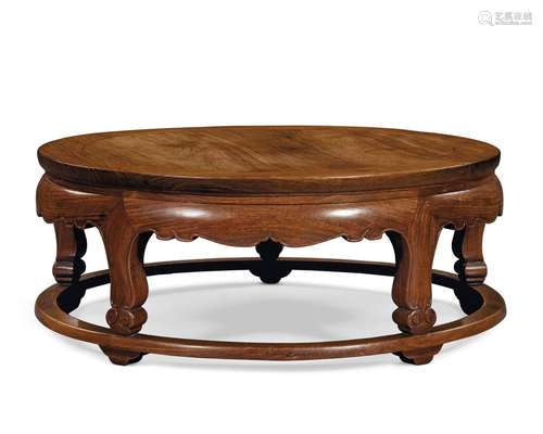 AN UNUSUAL HUANGHUALI ROUND LOW TABLE