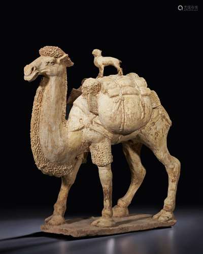 A LARGE WELL-MODELED STRAW-GLAZED BACTRIAN CAMEL