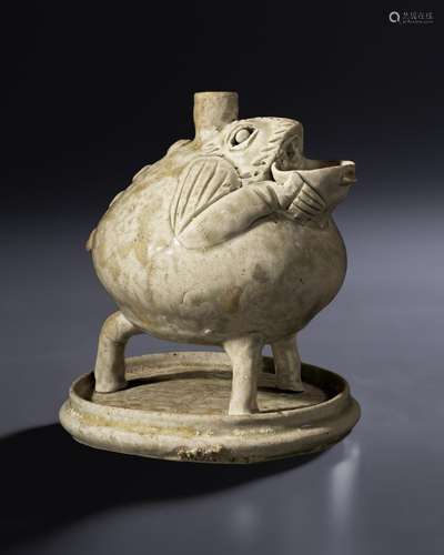 A VERY RARE YUE CELADON TOAD-FORM VESSEL