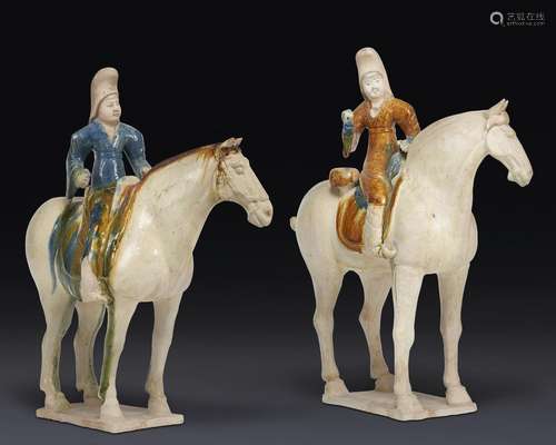 TWO RARE SANCAI AND BLUE-GLAZED POTTERY FIGURES OF EQUESTRIA...