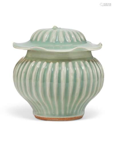 A SMALL LONGQUAN CELADON BALUSTER JAR AND COVER