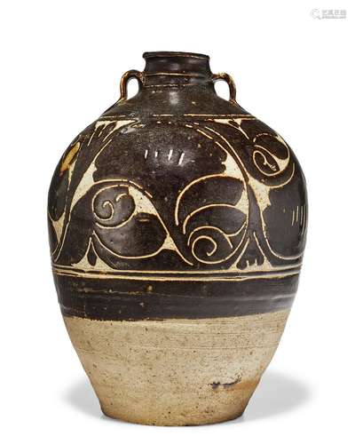 A CARVED CIZHOU BLACK-GLAZED OVOID JAR