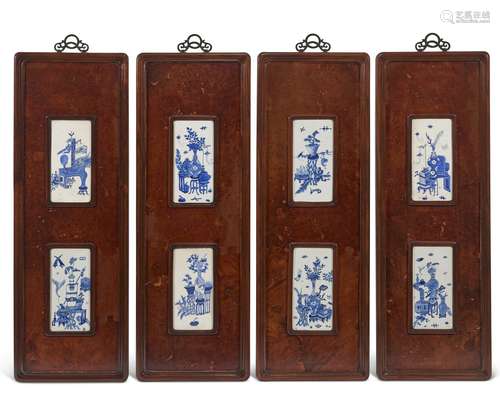 A SET OF FOUR BLUE AND WHITE BURLWOOD-MOUNTED HONGMU -INSET ...