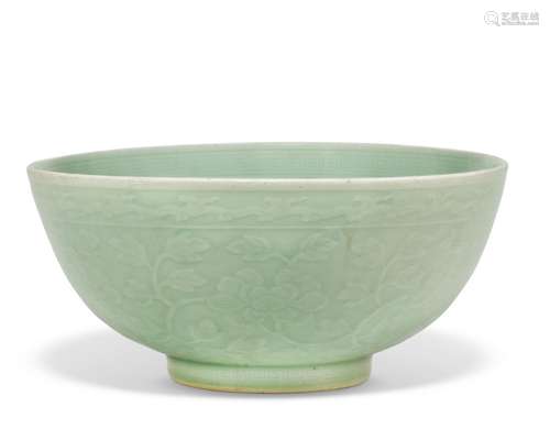 A LARGE MOLDED AND INCISED CELADON-GLAZED BOWL