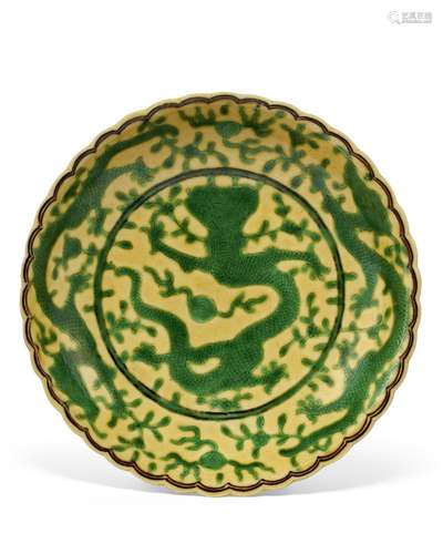 AN INCISED YELLOW AND GREEN-ENAMELED 'DRAGON’ DISH