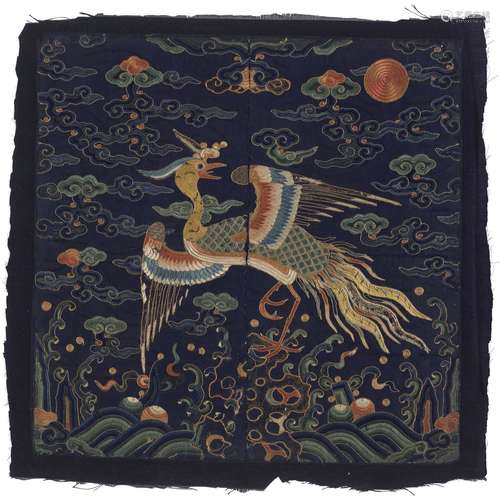 AN EMBROIDERED BLUE SILK RANK BADGE OF A GOLDEN PHEASANT, BU...