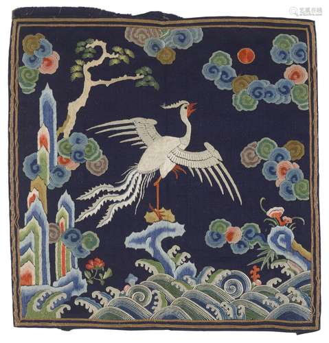 AN EMBROIDERED MIDNIGHT-BLUE SILK RANK BADGE OF A SILVER PHE...