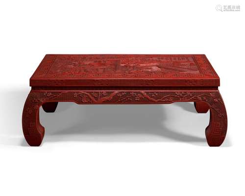 A CARVED RED LACQUER KANG TABLE