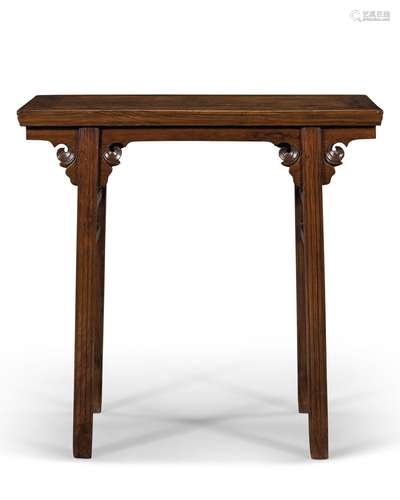 A HUANGHUALI RECESSED-LEG WINE TABLE