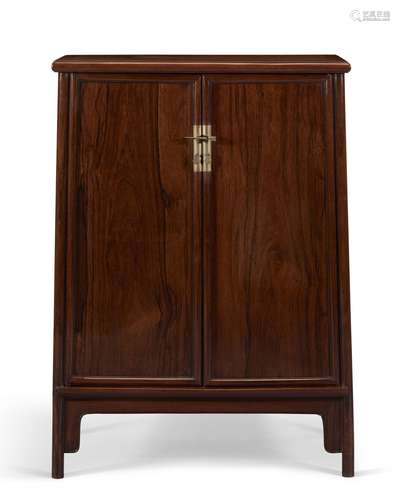 A HUANGHUALI ROUND-CORNER CABINET