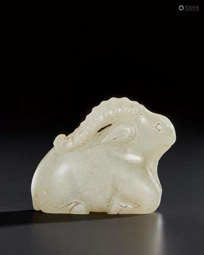 A RARE SMALL PALE GREENISH-WHITE JADE FIGURE OF A RECUMBENT ...