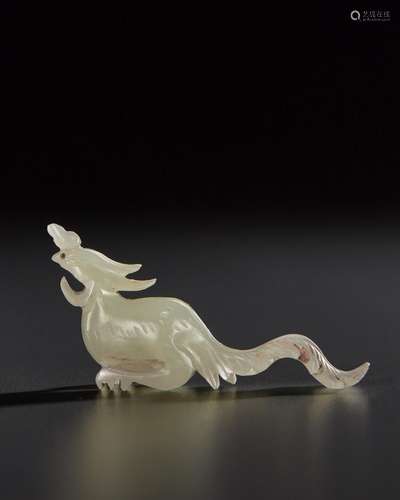 A SMALL PALE GREENISH-WHITE JADE FIGURE OF A PHOENIX