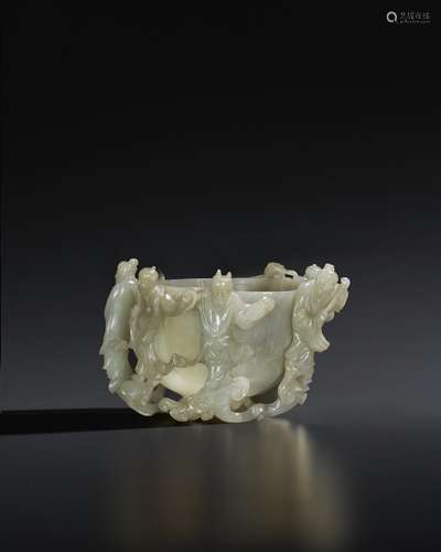 A GREENISH-WHITE JADE FIGURAL CUP