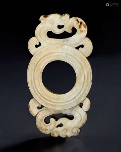 A SMALL CREAMY WHITE JADE ARCHAISTIC ORNAMENT