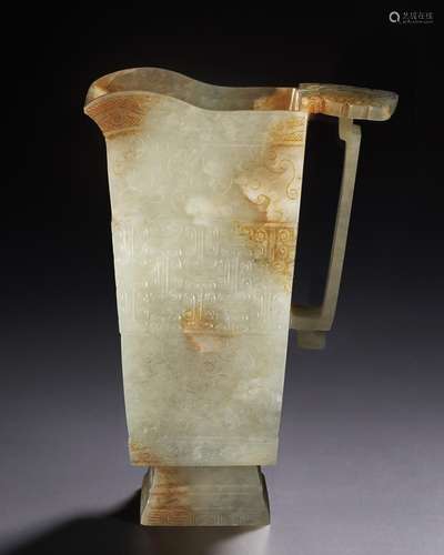 A PALE GREENISH-GREY JADE TALL POURING VESSEL