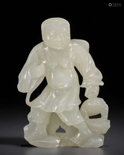 A GREENISH-WHITE JADE FIGURE OF LIU HAI